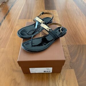 Coach Caterine Black Patent Leather T-Strap Sandals with Gold Accent